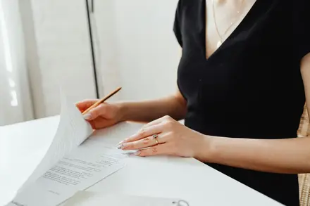Reviewing visa application forms and supporting documents